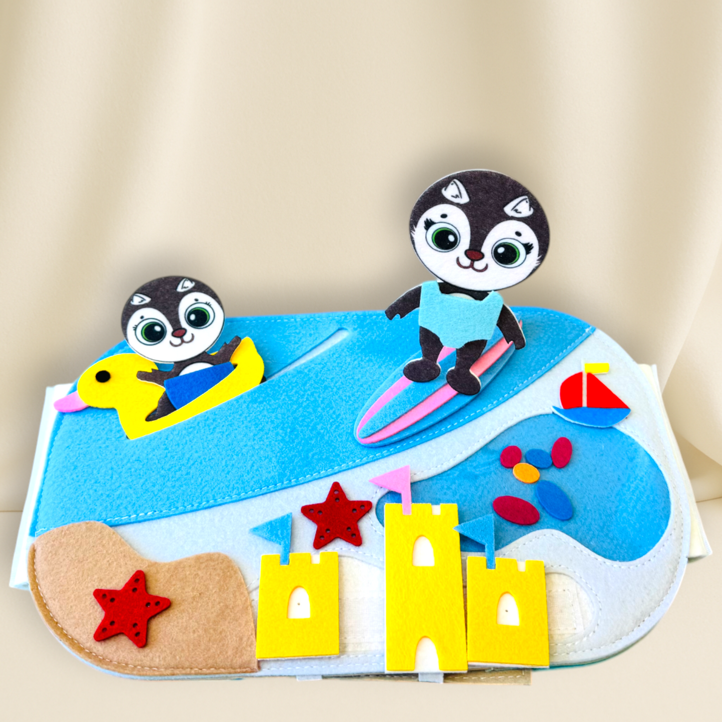 Colorful felt play mat with penguin characters